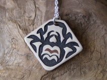 a stylized spider, silver engraving pendant necklace